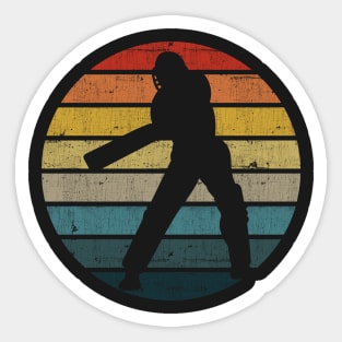 Cricket Player Silhouette On A Distressed Retro Sunset graphic Sticker